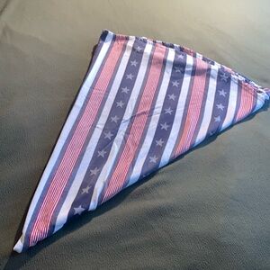 Round patriotic cotton tablecloth.  Red, white and blue with stars. Approx 64”